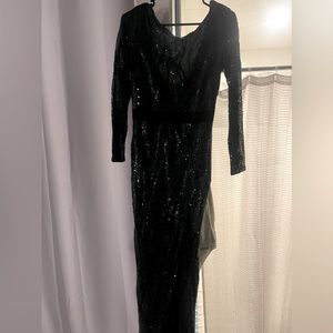 Sequin low back, long dress with knee high slit.